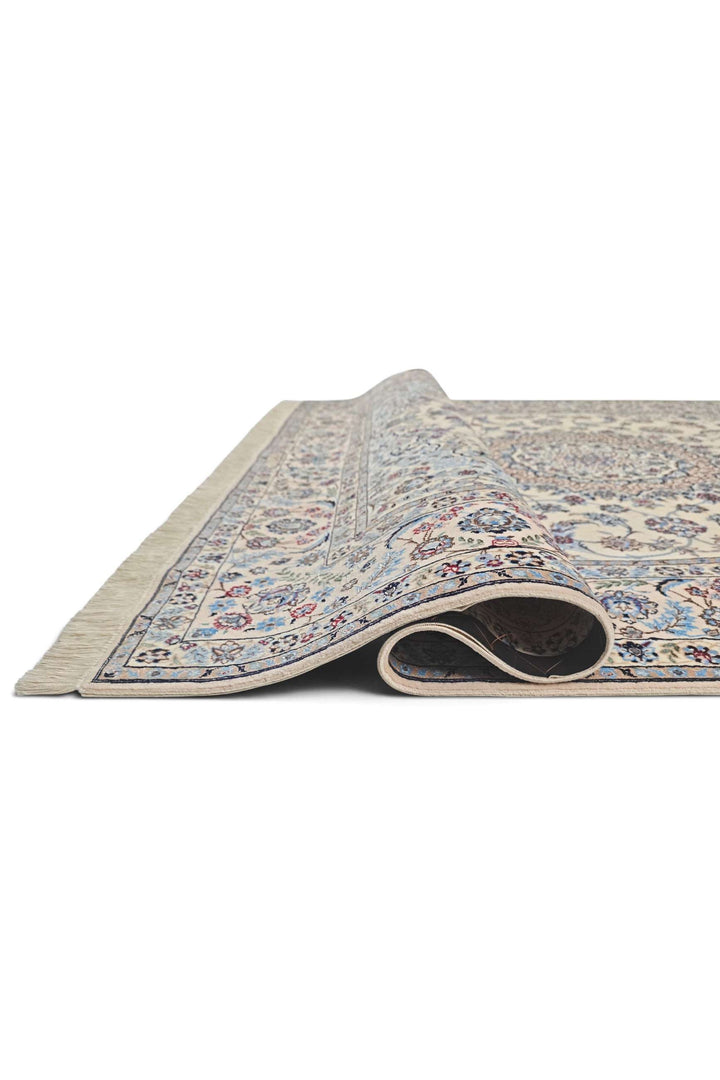 Corner of sandstone blue Nain hand-knotted rug