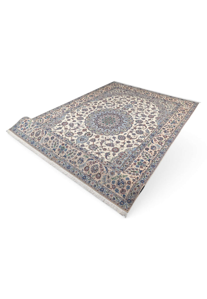 Corner of ivory blue bird border Nain rug