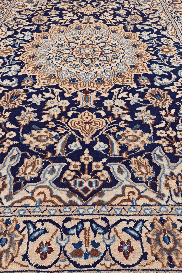 Hand-knotted Persian Nain rug with fine medallion work