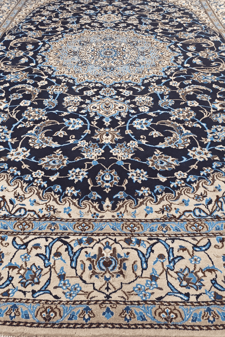 Fringe of navy and ivory Persian Nain rug