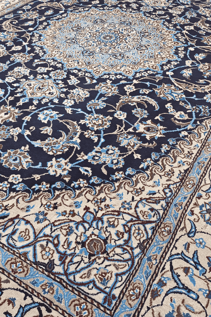 Border detail of navy ivory Nain hand-knotted rug