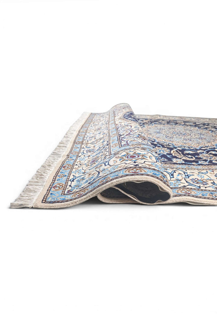 Corner of navy ivory Nain hand-knotted rug