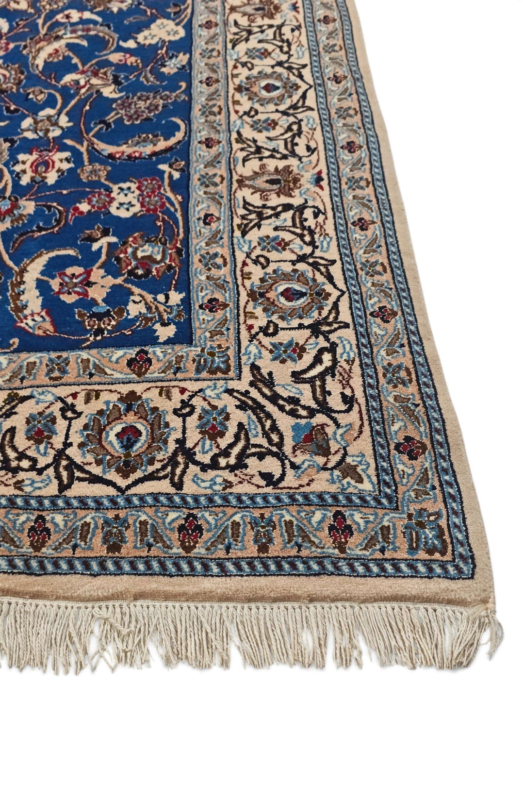 Corner of cobalt blue Nain hand-knotted rug