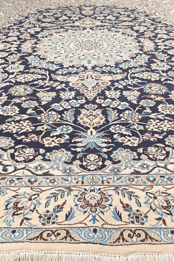 Fringe of royal blue Persian Nain rug
