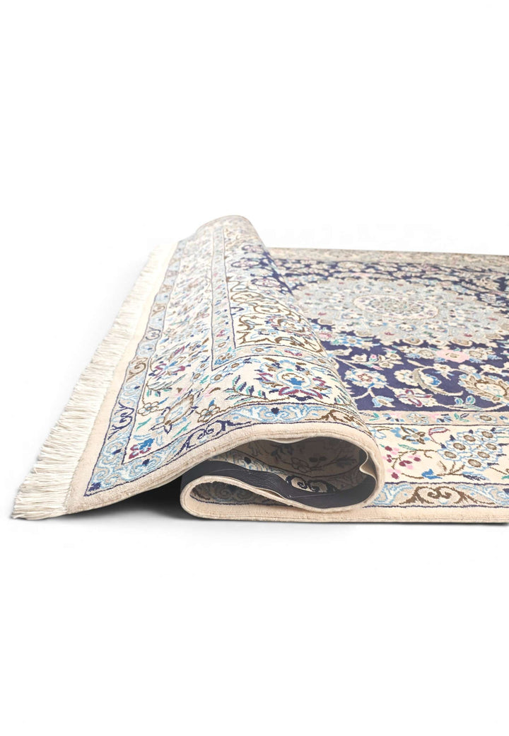 Corner of royal blue Nain hand-knotted rug