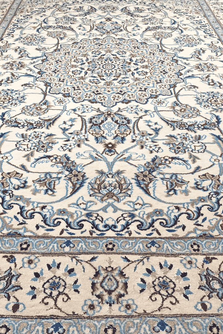 Ivory blue medallion Nain rug detail, Persian wool