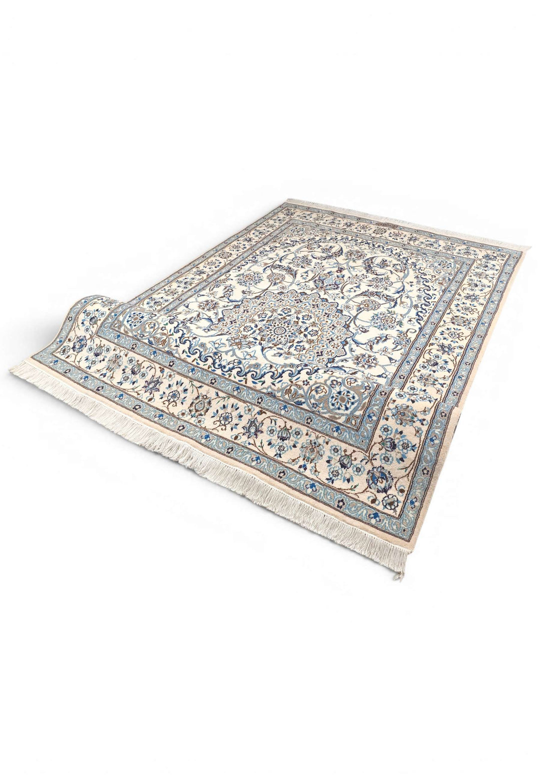 Corner of ivory blue Nain hand-knotted rug