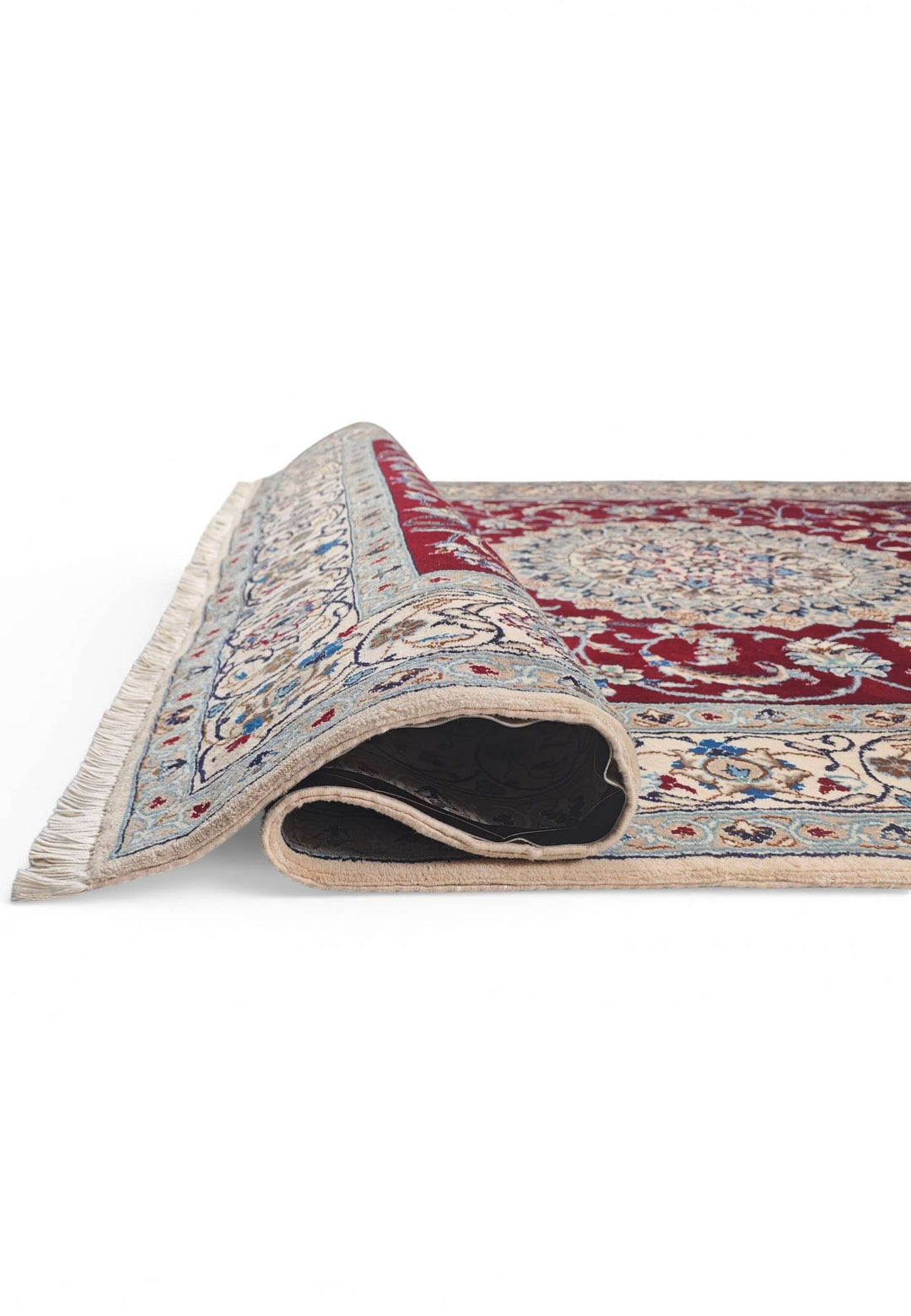 Fringe of wine red Persian Nain rug