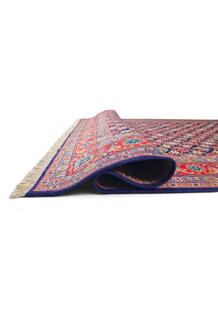Corner of navy mahi Sabzevar hand-knotted rug