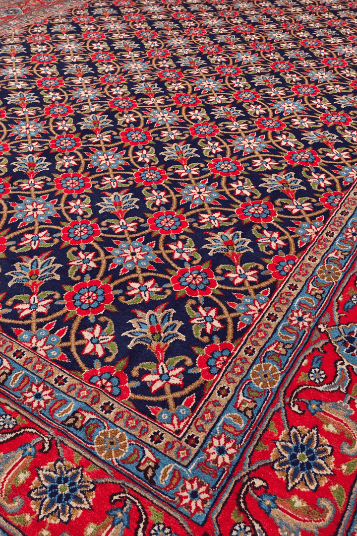 Border detail of navy mahi Sabzevar rug