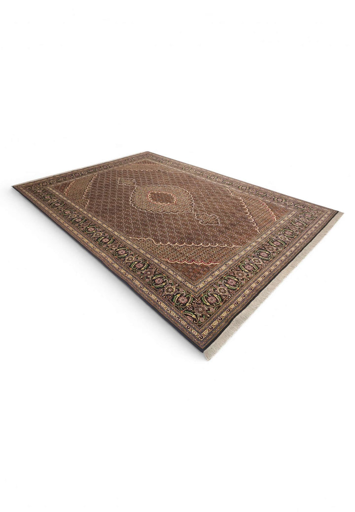 Hand-knotted Persian Tabriz rug with Herati field