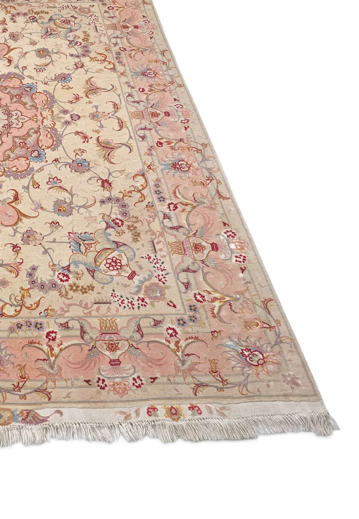 Hand-knotted Persian Tabriz rug with vase border design