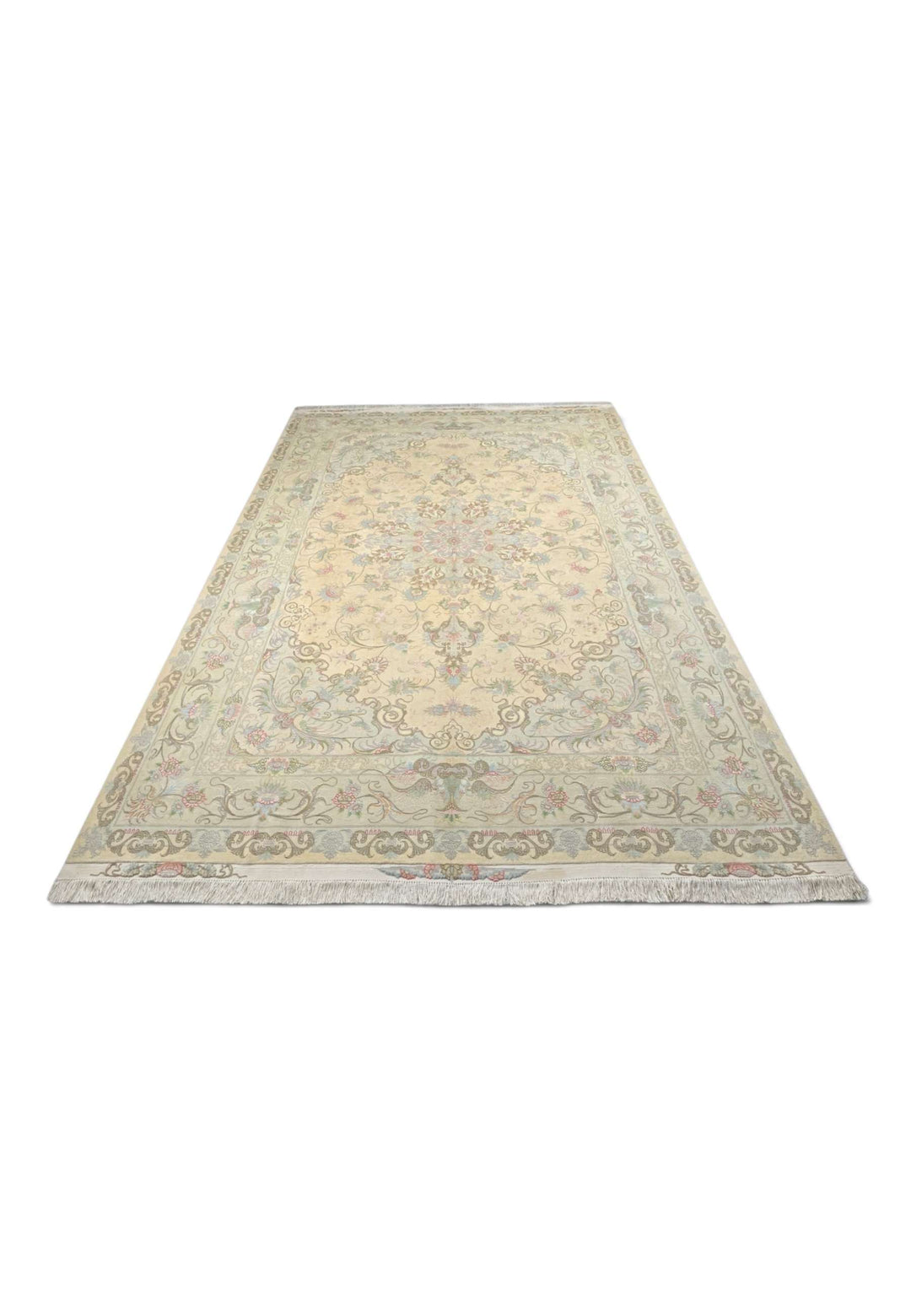 Border detail of cream soft pink Tabriz rug