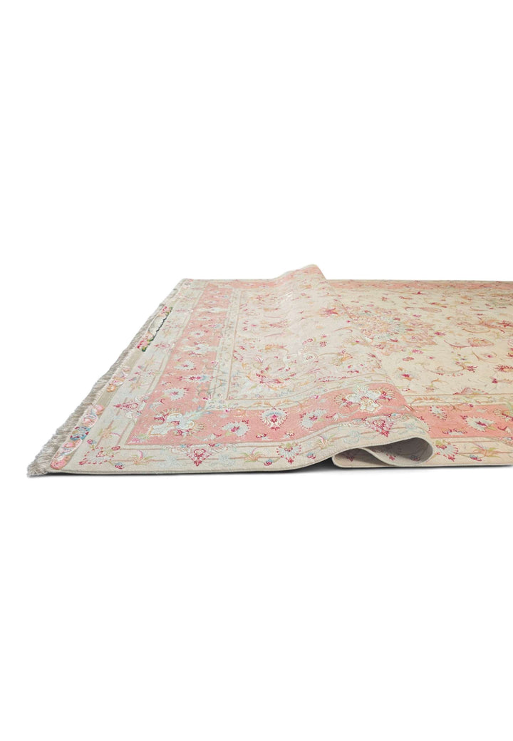 Hand-knotted Persian Tabriz rug with fine floral work