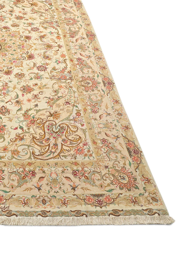 Cream gold radiating medallion Tabriz rug field