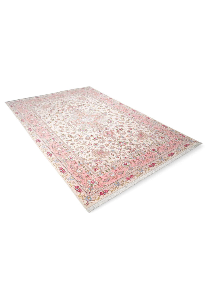 Fringe of cream and rose pink Persian Tabriz rug
