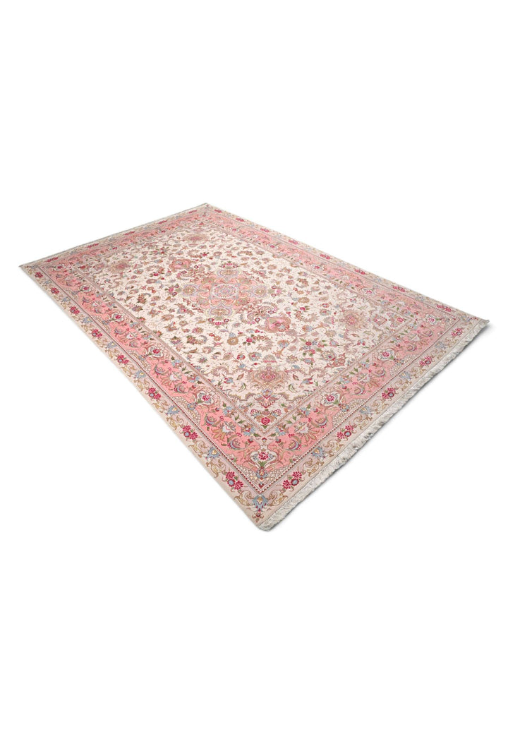 Hand-knotted Persian Tabriz rug with fine floral work