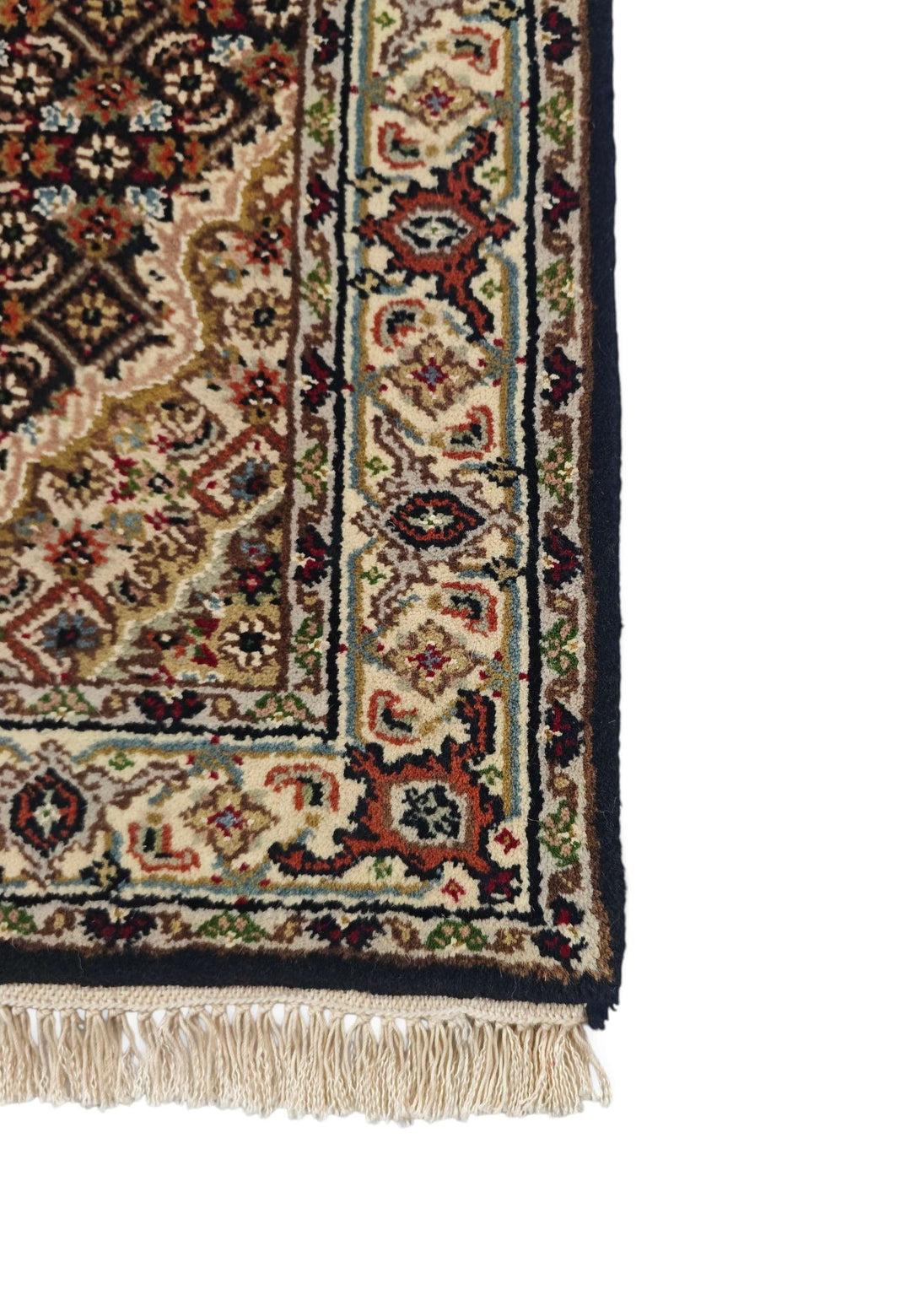 Hand-knotted Persian Tabriz rug with Herati field