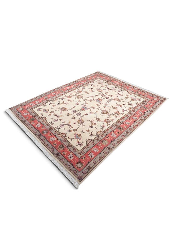 Hand-knotted Persian Tabriz rug with palmette field