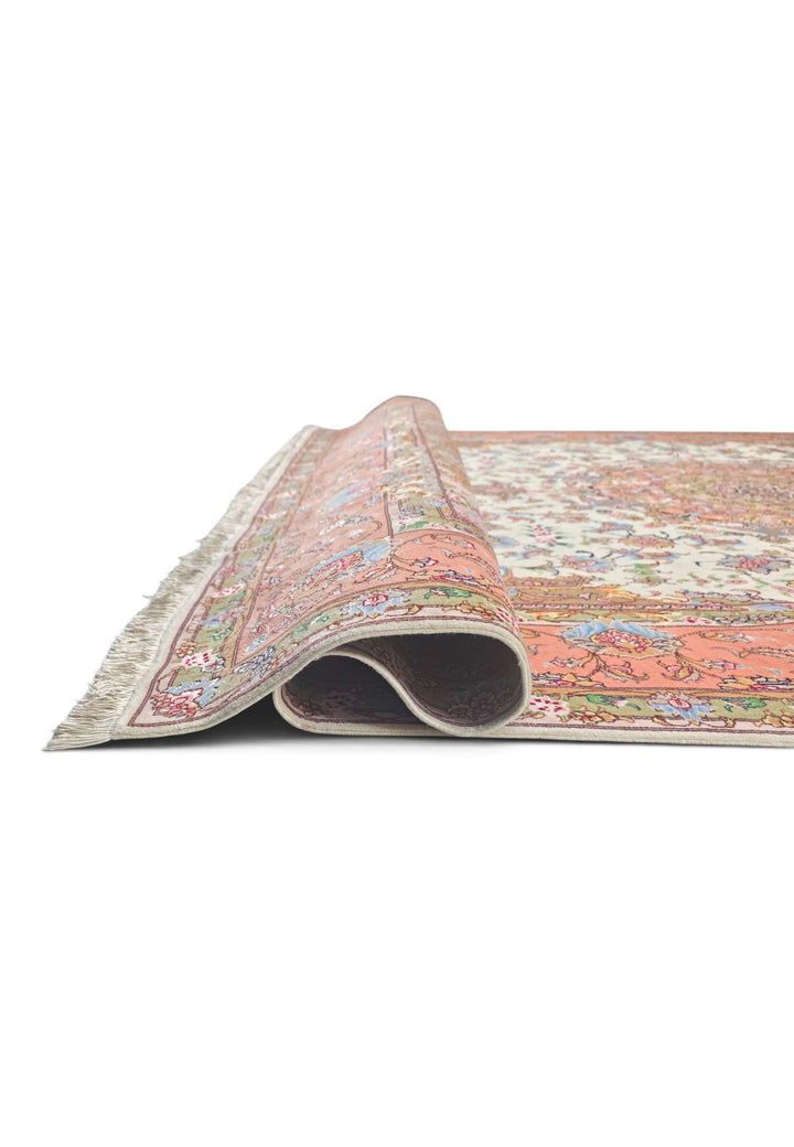 Fringe of ivory and coral Persian Tabriz rug