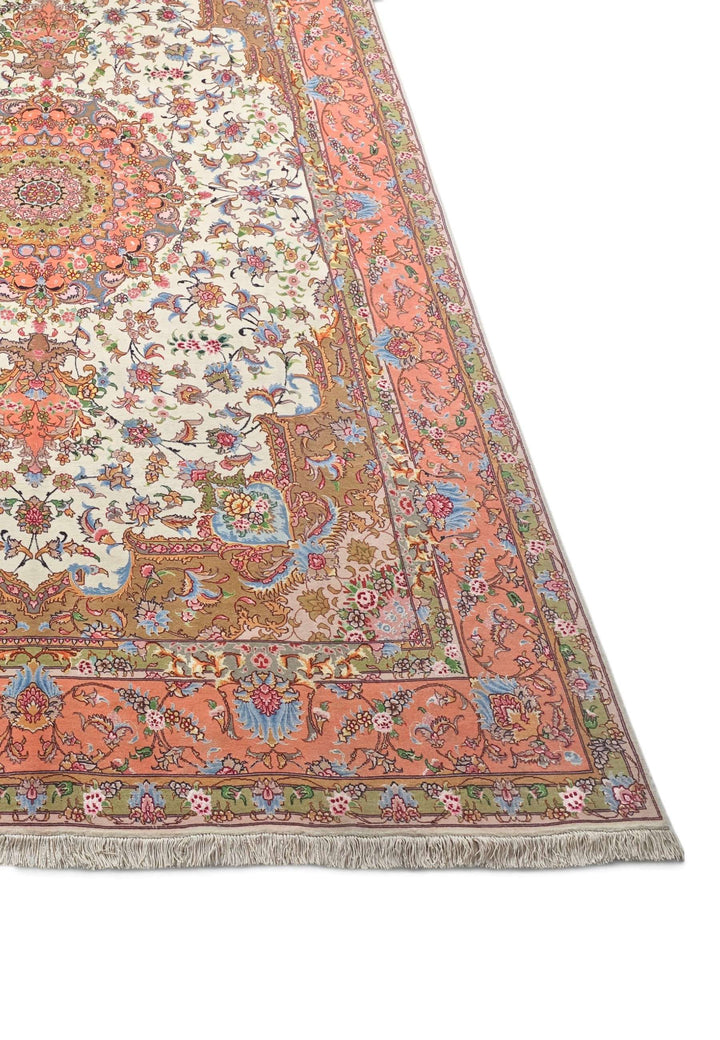 Ivory coral radiating medallion Tabriz rug field