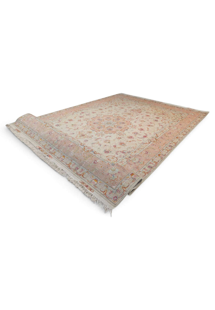 Hand-knotted Persian Tabriz rug with fine floral work