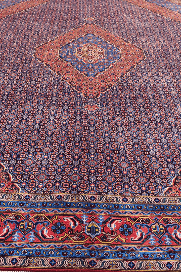 Hand-knotted mauve Pakistani rug with mahi Herati field