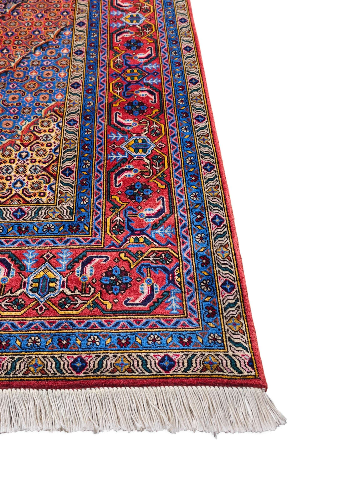 Corner of mauve and salmon Herati hand-knotted rug