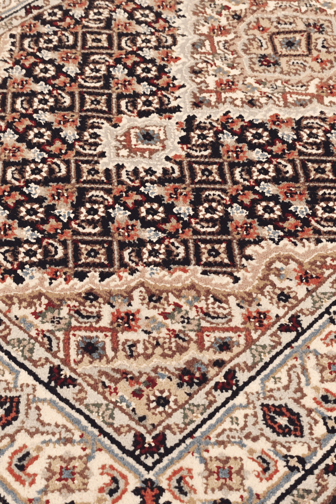 Mahi medallion detail in sandstone on Persian Tabriz rug